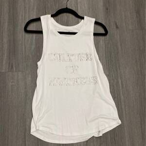 NEW WORDS COUNT women's culture of kindness graphic muscle tank in white